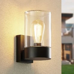 Aplique de exterior Arcchio Liljana, negra, 21 cm, IP65, cristal