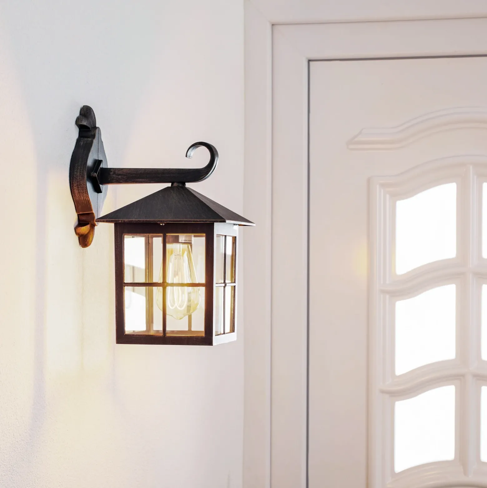 Aplique de exterior Ida de Lindby, color óxido, farol, 34 cm, E27