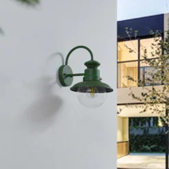 Aplique de exterior Lindby Celinor, verde, acero, Ø 15 cm
