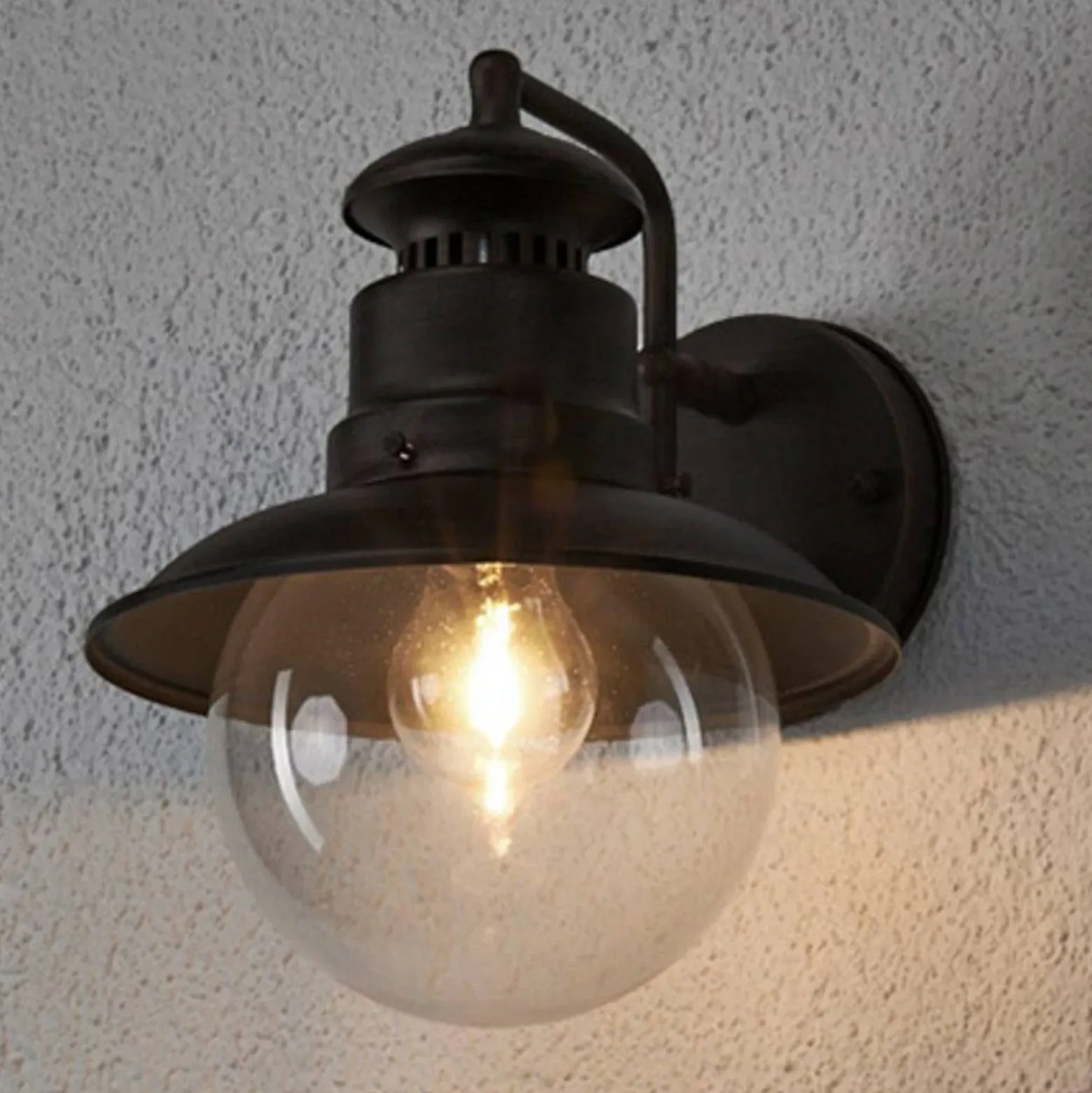 Aplique de exterior Lindby Eddie, color óxido, metal, IP44, E27