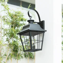 Aplique de exterior Lindby Mertollio, altura 47 cm, negra, cristal