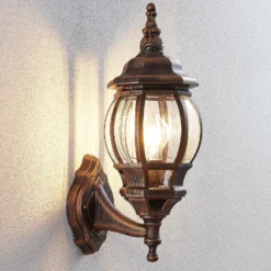 Aplique de exterior Lindby Nadesha, altura 47 cm, dorado cepillado