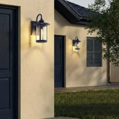 Aplique de exterior Lindby Zayn, azul, cristal, altura 33 cm, IP23