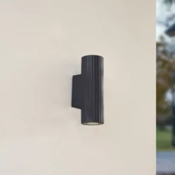 Aplique de pared Christa de Lindby, antracita, hormigón, 25 cm, estriado
