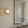 Aplique de pared LED Hugo de LOOM DESIGN, negro/transparente, Ø 17 cm, IP65