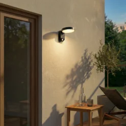 Aplique de pared LED PRIOS Tarlson, redonda, antracita, sensor