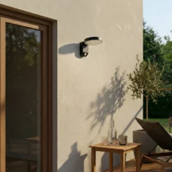 Aplique de pared LED PRIOS Tarlson, redonda, antracita, sensor