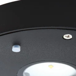 Aplique de pared LED solar Lucande Tavon, redondo, negro, sensor
