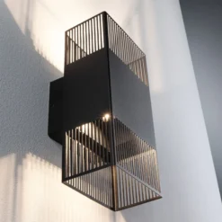 Aplique de pared LED Tharin de Paulmann, 25 cm, negro, luz hacia arriba/abajo,