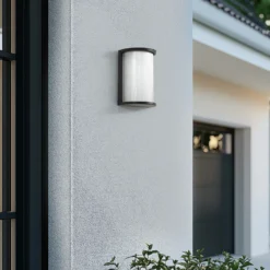Aplique LED para exterior Calvik de Lindby, negro, estriado, IP44