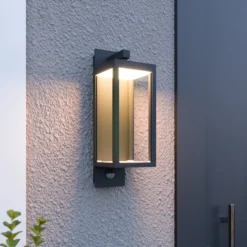 Aplique LED para exterior Ferdinand de Lucande, sensor, gris oscuro