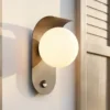 Aplique LED para exterior Lindby Lacie, sensor, blanco/negro, aluminio