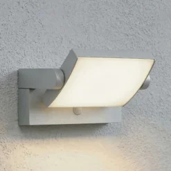 Aplique LED para exterior Lindby Sherin, gris claro, orientable, con sensor