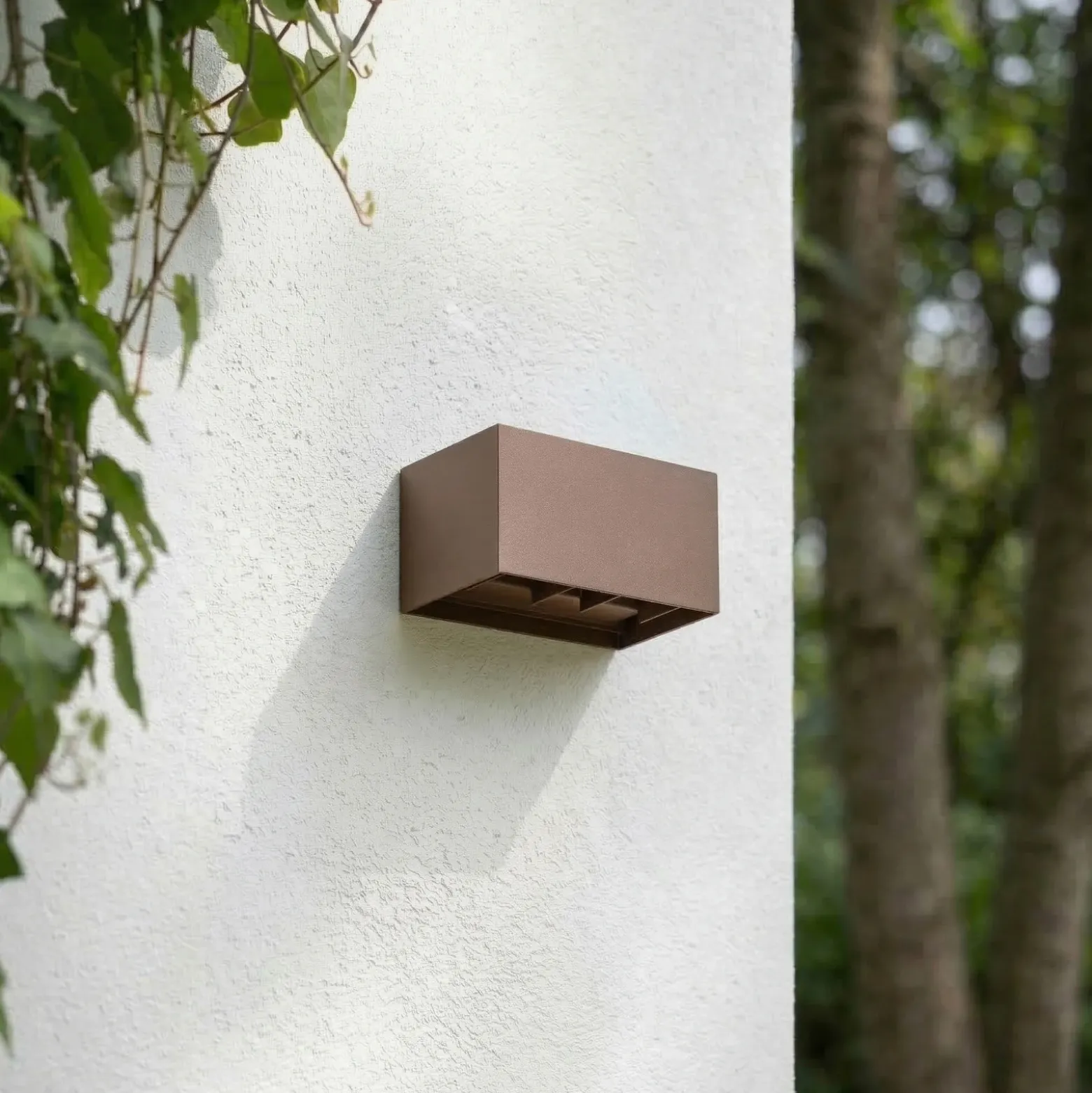 Aplique LED para exterior Lindby Nivar, angular, color óxido, 20 cm, IP54