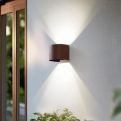 Aplique LED para exterior Lindby Smart Dara, redonda, color óxido, CCT RGB, Tuya