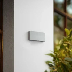 Aplique LED para exterior Lindby Jarte, plateada, metal, 17 cm, IP54