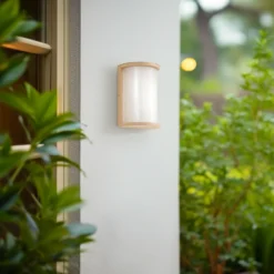 Aplique LED para exterior Lindby Calvik, beige, estriado, IP44