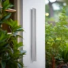 Aplique LED para exterior Lucande Melira, 100 cm de largo, gris claro