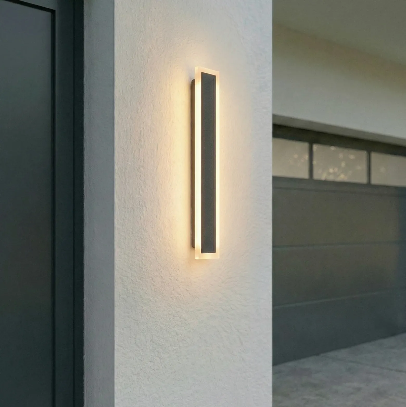Aplique LED para exterior Lucande Ilora, negra, 60 cm, CCT, IP65