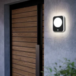 Aplique LED para exterior Madriz, negra, 23 cm de ancho, con sensor