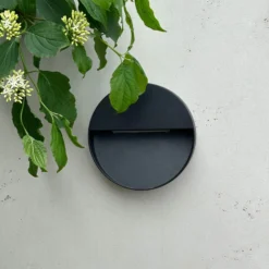 Aplique LED para exterior Pluto de Dyberg Larsen, negra, Ø 15 cm