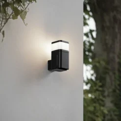 Aplique para exterior Lindby Teyon, con enchufe, negro, IP44 G9