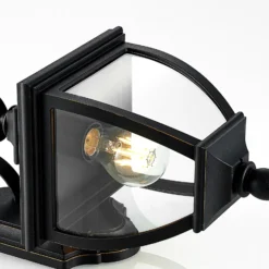 Aplique para exterior Lindby Cerys, negro, de plástico, altura 37 cm