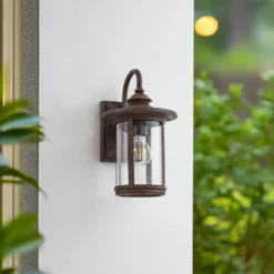 Aplique para exterior Lindby Zayn, color óxido, cristal, IP23