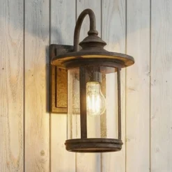 Aplique para exterior Lindby Zayn, color óxido, cristal, IP23