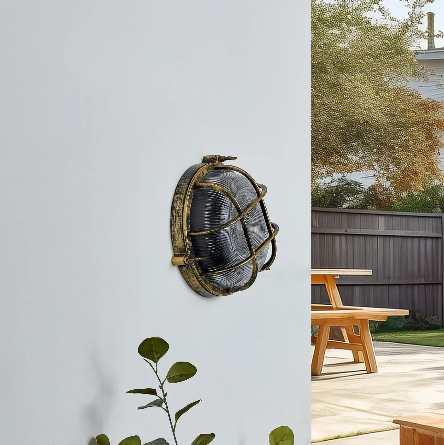 Aplique para exterior Lindby Daaje, dorado, Ø 26 cm, aluminio