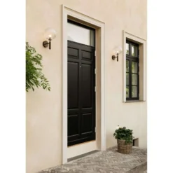 Aplique para exterior Nuura Miira, Ø 20 cm, bronce oscuro/transparente