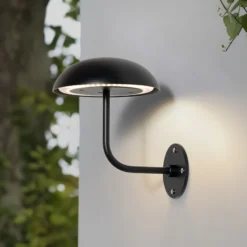Arcchio LED lámpara de mesa recargable Thenra, negro, soporte de pared