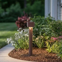 Bolardo luminoso LED Arcchio Milten, 65 cm, color óxido, IP65, con sensor