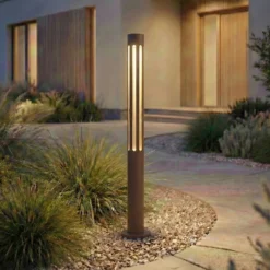 Bolardo luminoso LED Lindby Fjorya, altura 60 cm, marrón, IP65