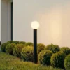 Bolardo luminoso Lindby Dangan, negro/blanco, altura 90 cm, cristal