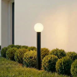 Bolardo luminoso Lindby Dangan, negro/blanco, altura 90 cm, cristal