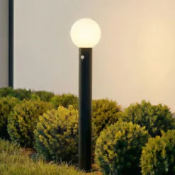 Bolardo luminoso Lindby Dangan, negro/blanco, 90 cm, cristal, sensor