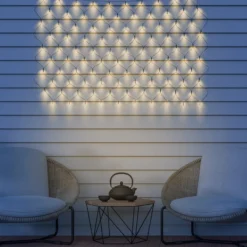 Cortina de luces LED solar IP44, 110 x 90 cm, 100 luces