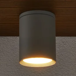 Foco de exterior Lucande Minna, plateado, 14 cm, IP54, E27