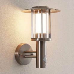 Lindby Aplique LED para exterior Gregory, sensor, acero inoxidable, IP44