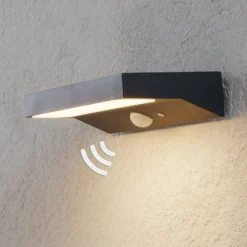 Lindby Aplique LED solar para exterior Maresia, sensor, antracita