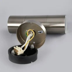 Lindby Aplique para exterior Hakan, arriba/abajo, acero inoxidable, IP44, GU10
