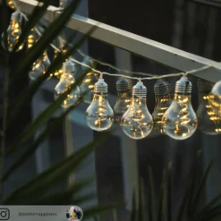 Lindby Cadena de luces LED Lampini, 200 cm, negro, IP44