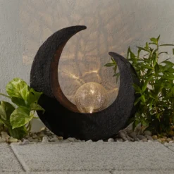 Lámpara decorativa LED solar de Lindby Adem, marrón rojizo, cristal, 31 cm