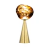 Lámpara de mesa LED recargable Melt de Tom Dixon, color dorado, altura 29 cm