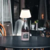 Lámpara de mesa LED solar 36000 tapa de botella plástico blanco
