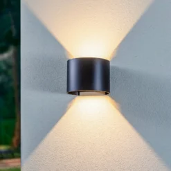 Lámpara de pared LED para exteriores Nivar de Lindby, redonda, negra, IP54