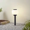 Lámpara de pie Orfeas de Lindby, blanco/negro, aluminio, Ø 24 cm