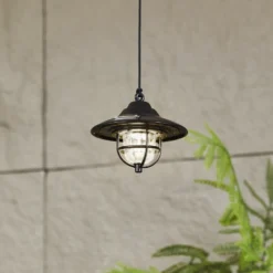 Lámpara exterior LED Lindby Ketil, negra, pica de tierra, batería