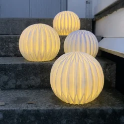 Lámpara LED para terraza Sandy, Ø 30 cm pila de plástico blanco